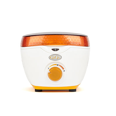 Front view of GiGi Mini Honee Wax Warmer featuring its orange lid, markings, LED indicator light, & temperature control knob