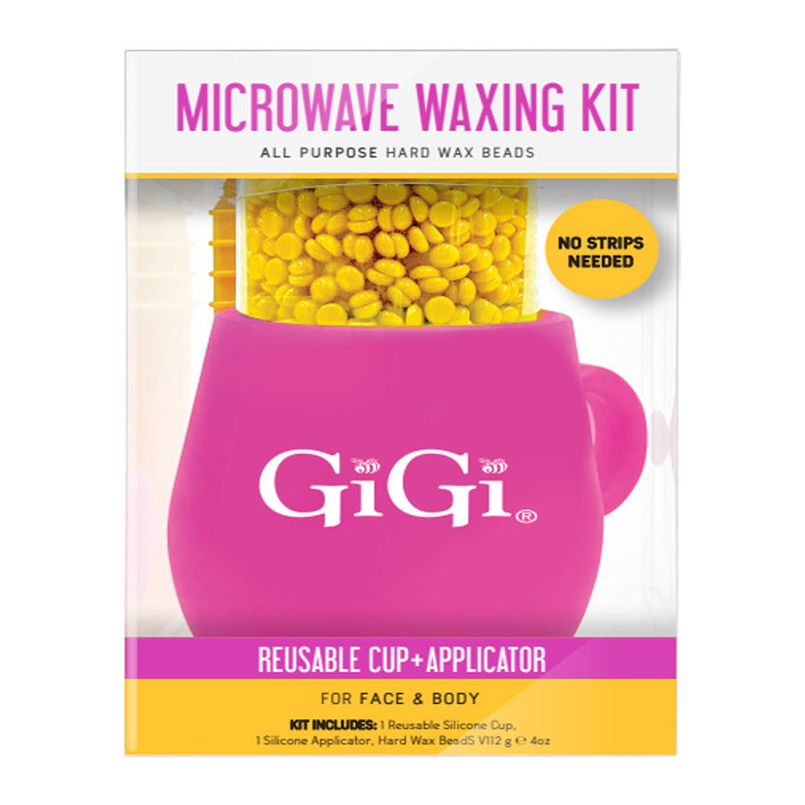 GiGi Microwave Waxing Kit in retail packaging, featuring a bright pink reusable silicone cup and applicator filled with yellow hard wax beads, with text indicating it is for face and body and includes reusable silicone dishes.