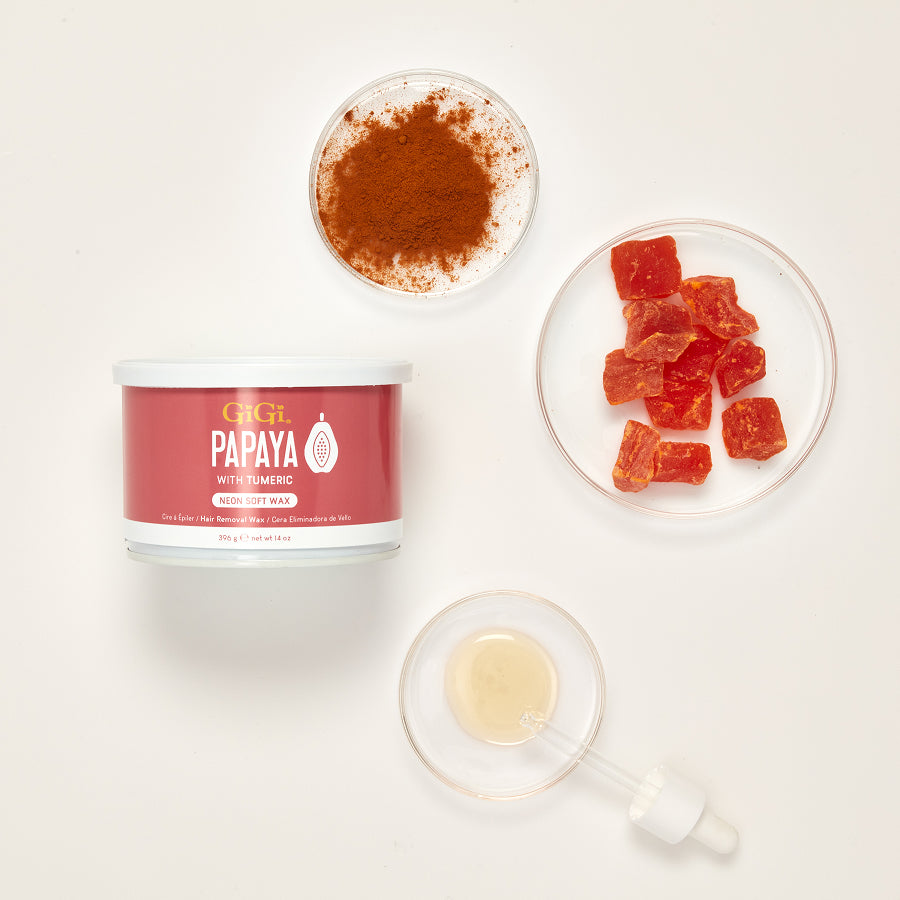 GIGI Papaya product with papaya powder, gummies, and a dropper on a white background