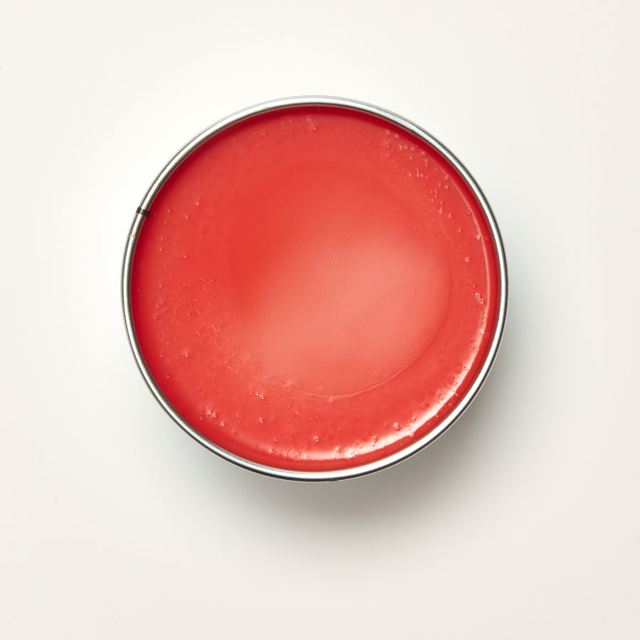 Red wax on a white background