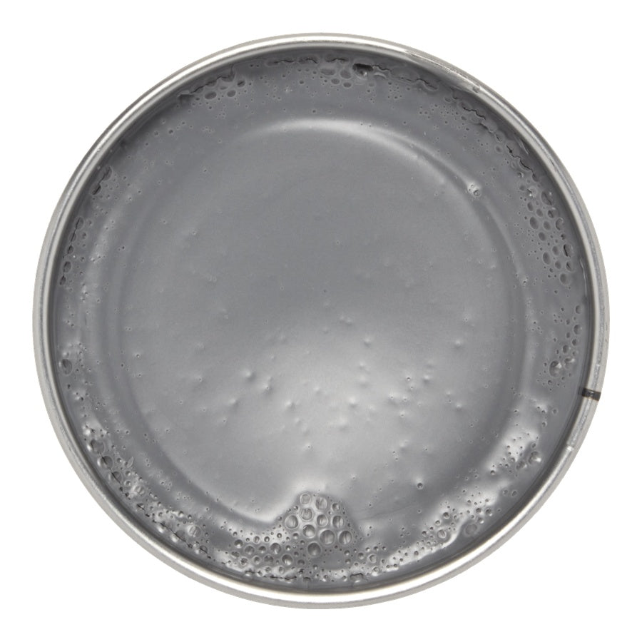 Gray wax can with a textured surface on a white background