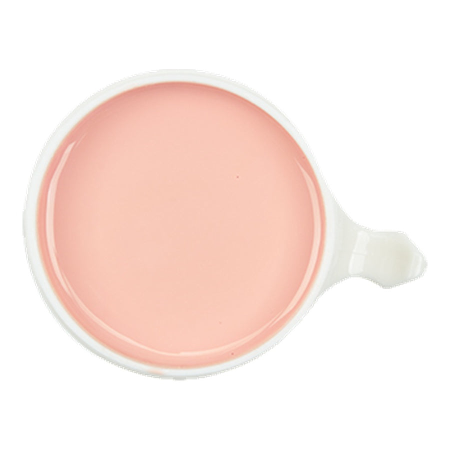 Pink wax with a handle on a white background