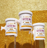 Three containers of GiGi Glitter Wax on a gold glitter background