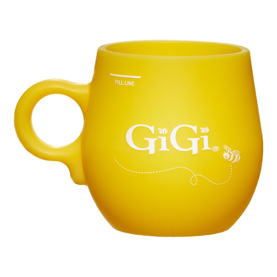 Yellow mug with 'GiGi' branding on a white background