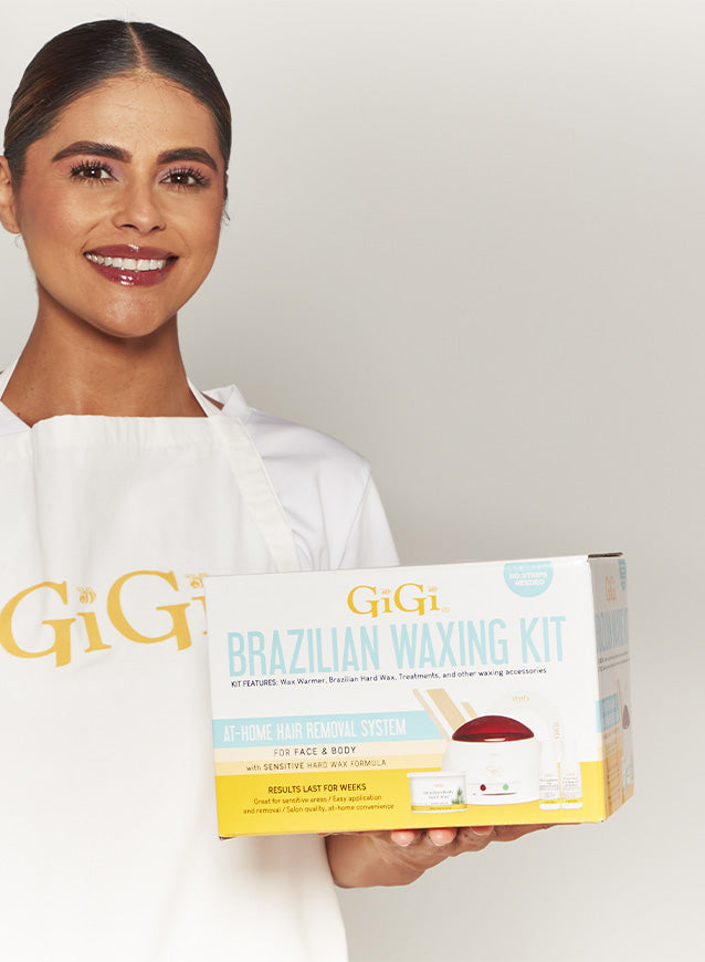 Women holding a GiGi Brazilian Waxing Kit