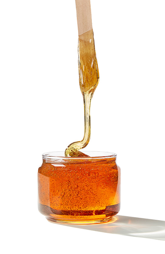 GiGi honee wax in a glass jar
