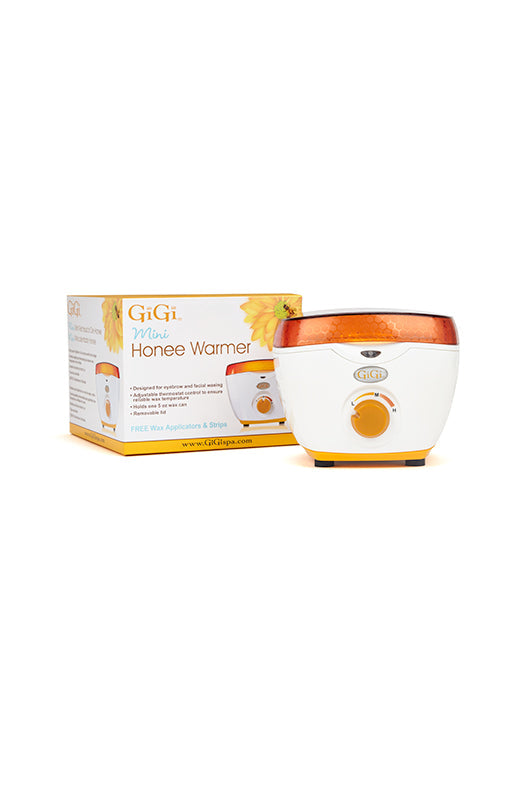 GiGi Mini Honee Wax Warmer in front of its retail box packaging