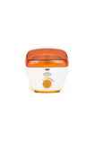 Tilted top view of GiGi Honee Wax Warmer with its wax well showing through its orange lid