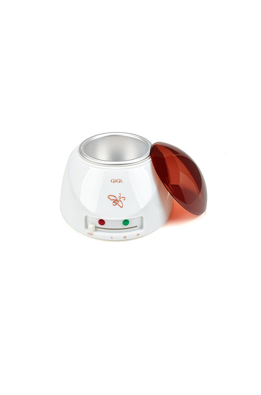 Angled top view of the GiGi 14 Ounce Wax Warmer with its lid leaning into on its left side
