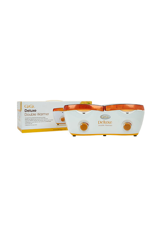 GiGi Double Wax Warmer in front of its retail box packaging 