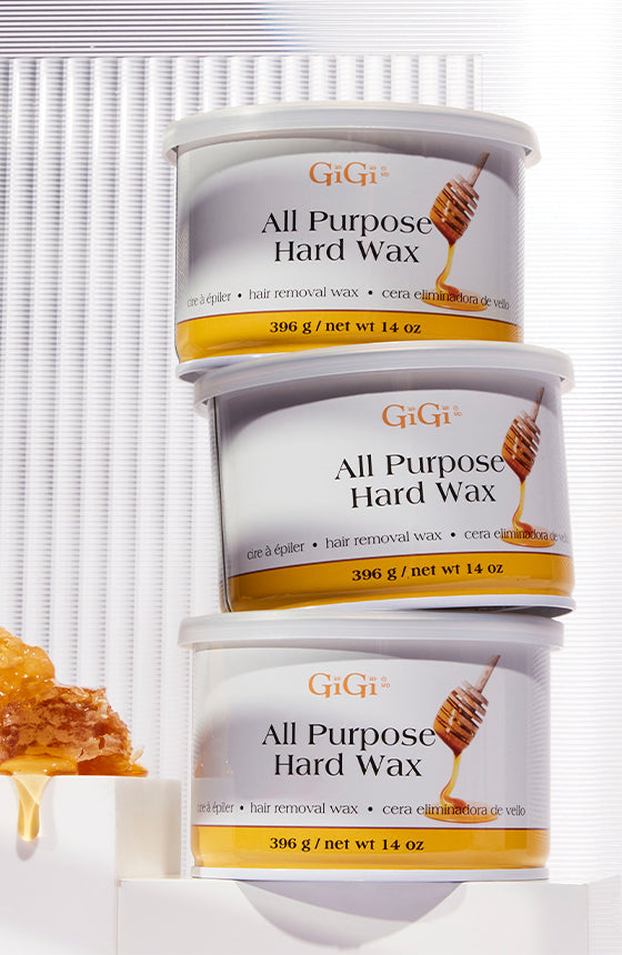 All Purpose Hard Wax cans stacked up on a stylized background